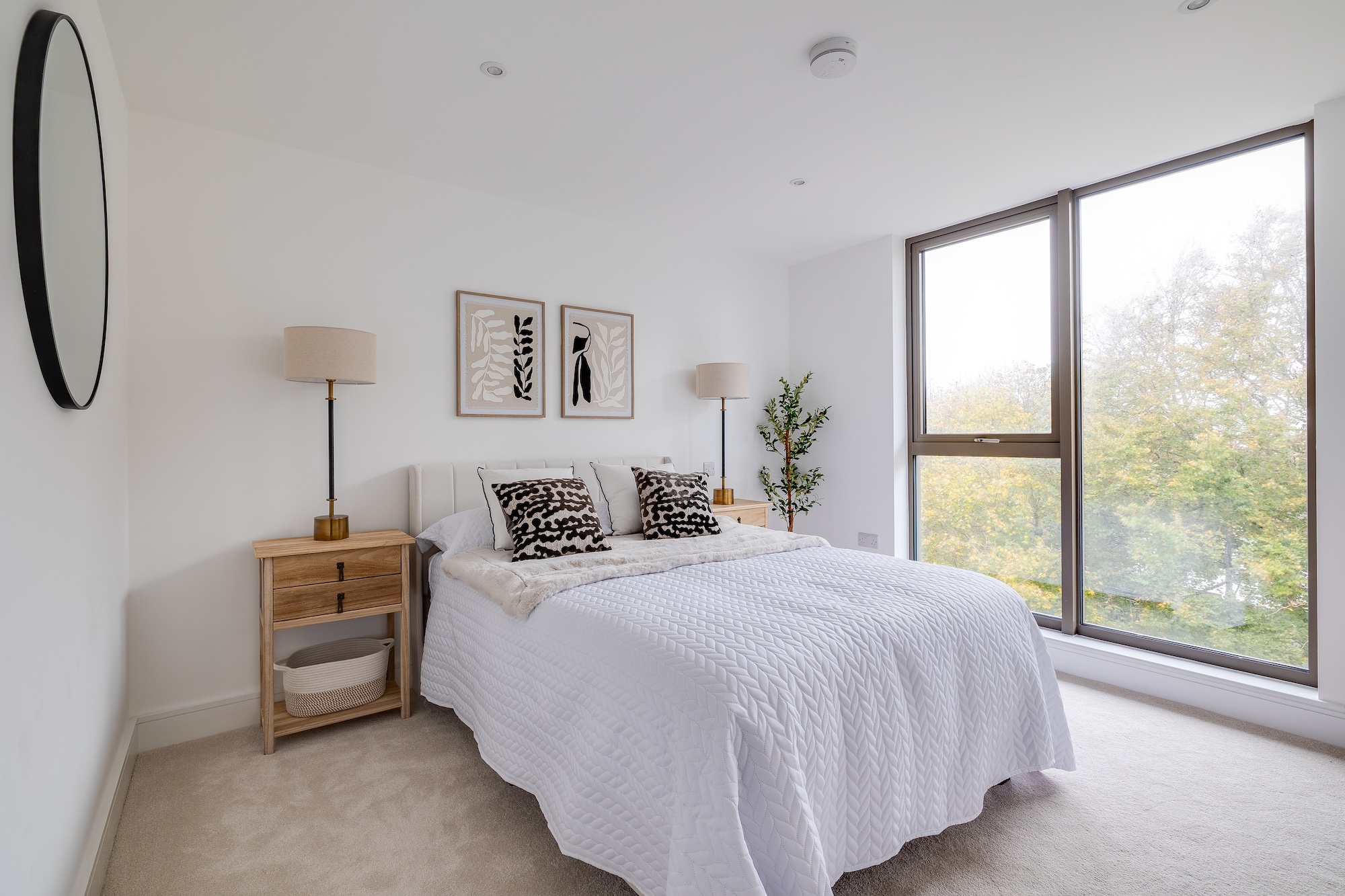 A bedroom in one of the luxury two-bedroom apartments available in the new and exclusive Hilbre Sands Development on the waterfront of West Kirby's sought after Marine Lake. In partnership with Currans Unique Estate Agents (Cheshire, the Wirral, North Wales).