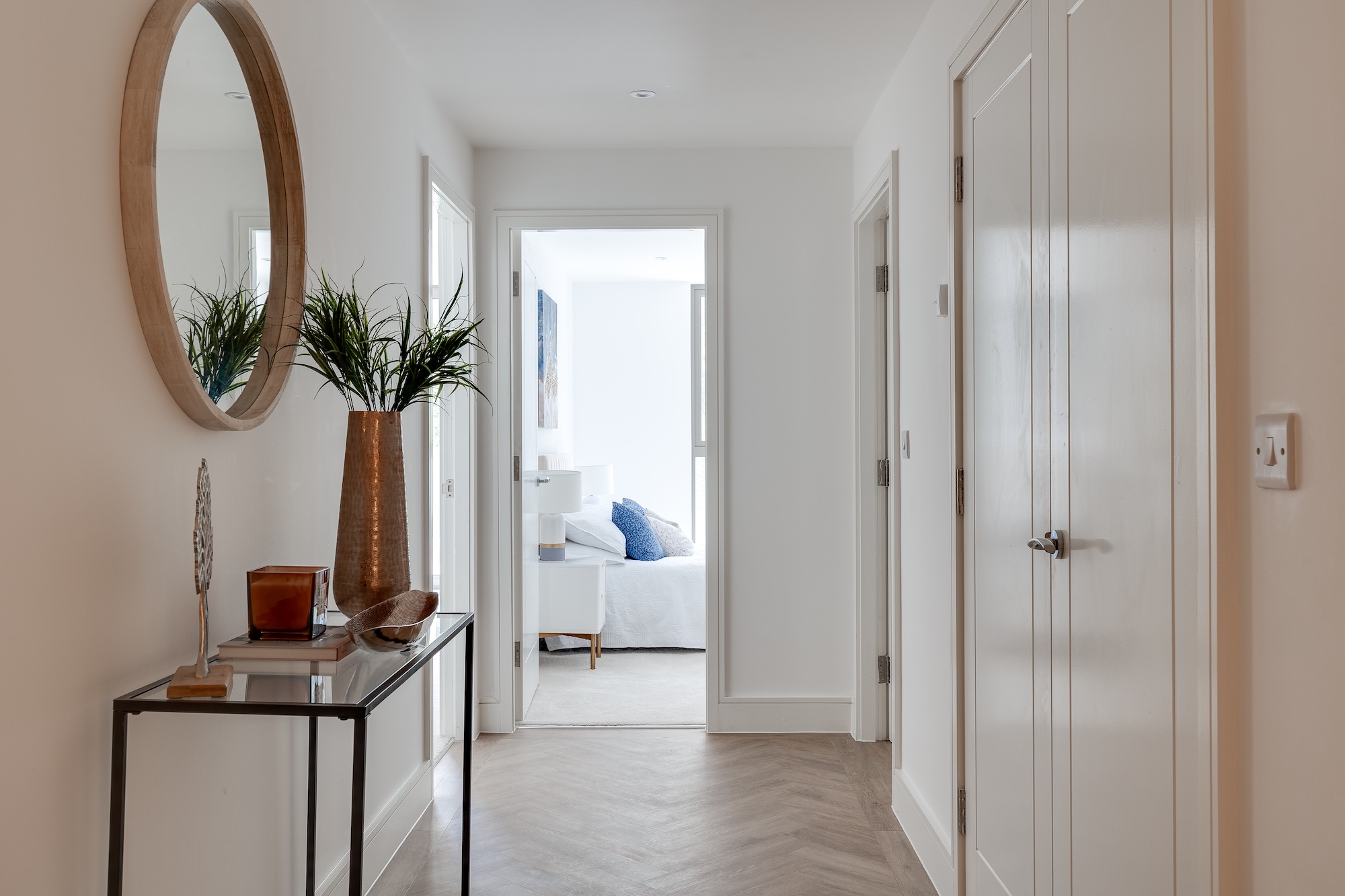 The hallway of one of the luxury two-bedroom apartments available at the new and exclusive Hilbre Sands development on West Kirby's sought after Marine Lake. Apartements sold in partnership with Currans Unique Estate Agency (offices in Chester, Heswall and North Wales).